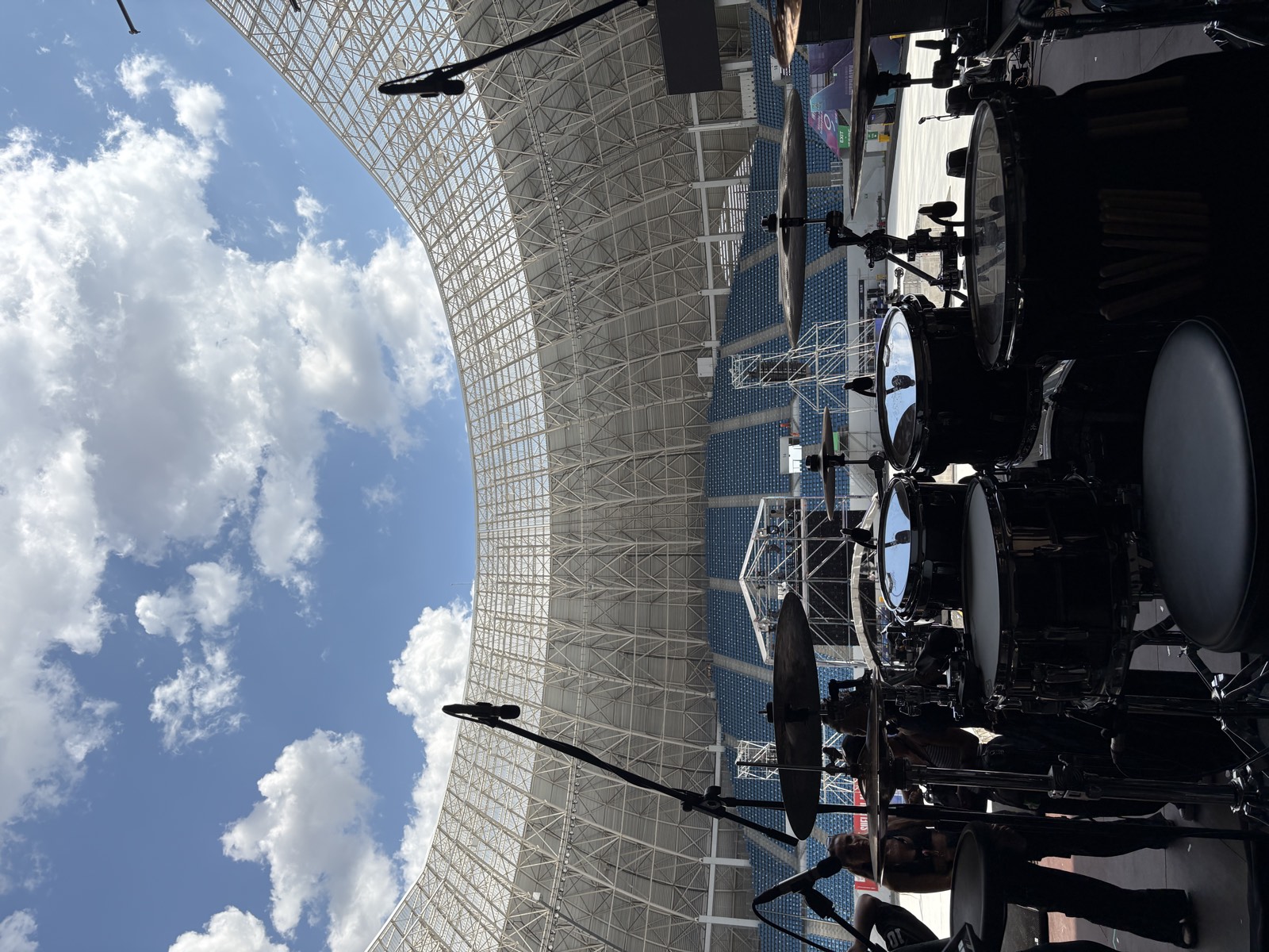 Drum kit built on a stadium stage before doors