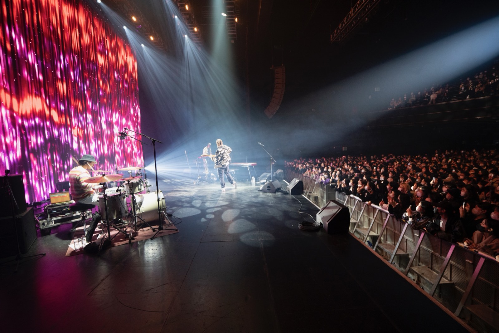Wide theatre stage mid-show